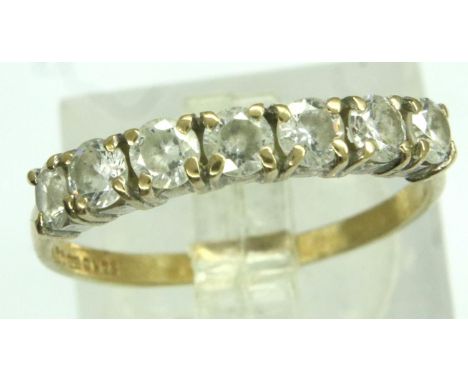 9ct gold ring, set with seven white stones, size O/P, 1.6g. P&amp;P Group 1 (£14+VAT for the first lot and £1+VAT for subsequ