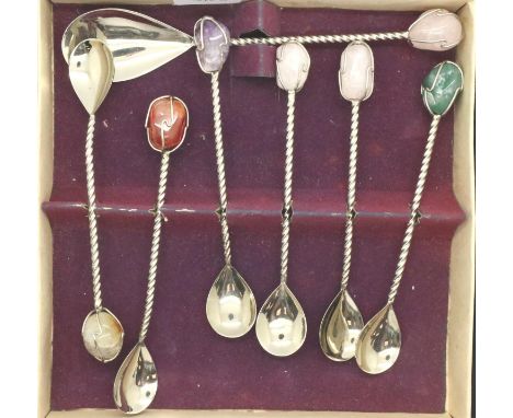 Boxed set of six white metal teaspoons and preserve spoon, all with semi precious stone tops. P&amp;P Group 1 (£14+VAT for th
