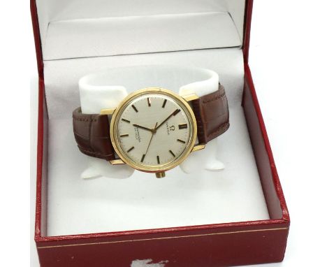 Omega: 9ct gold Seamaster Deville mechanical wristwatch, working at lotting. P&amp;P Group 1 (£14+VAT for the first lot and £