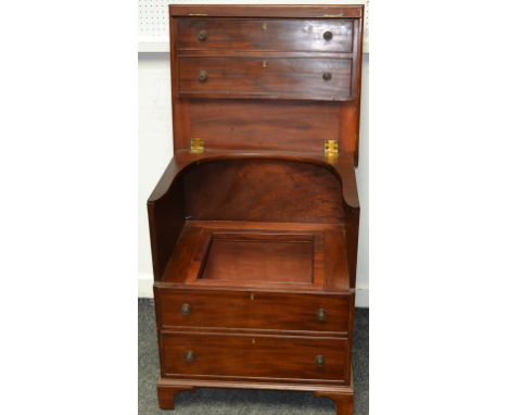 A Regency mahogany commode in the form of a four drawer chest, brass drum handles. 73cm high x 62cm wide x 51cm deep.