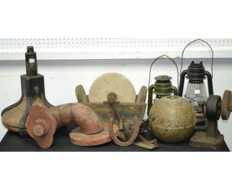 Tools - a 19th century stone grinding wheel; another, 20th century bench mountable; storm lamps; a miner's safety lamp; engin