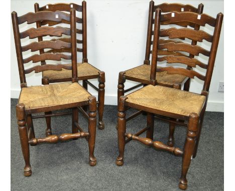 Four ladder back raffia seated country kitchen chairs