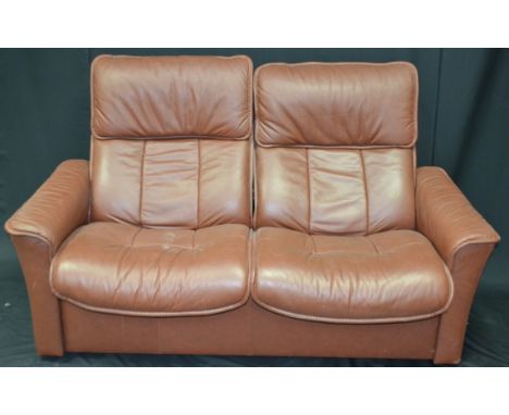 A reclining two seat sofa