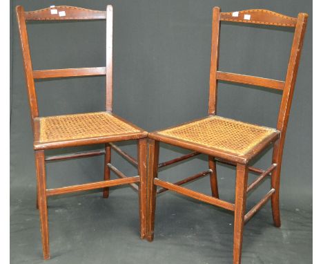 A Edwardian inlaid mahogany dressing table, oval mirror and two short drawers to superstructure, two short drawers over two l