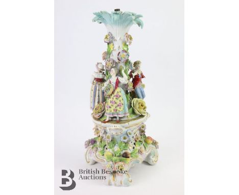 German 19th century figural lamp base, three flower sellers arranged around a central column with applied flowers, supported 