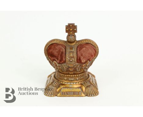 Elizabeth II pin cushion, to commemorate her coronation, R.No 2981252, approx 10 cms h, together with an enamel coach and hor