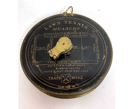 A rare early vintage lawn tennis measure in original case with Jappened court dimensions, printed roll fabric band with centr