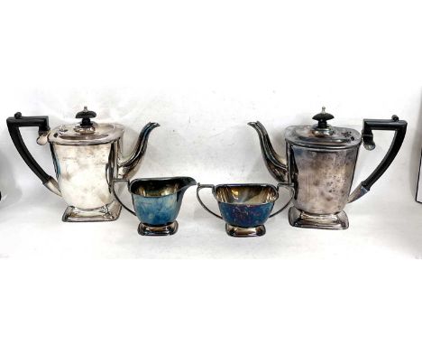 A Queen Elizabeth II four piece silver tea service comprising tea and coffee pot having ebonised finials and handles together