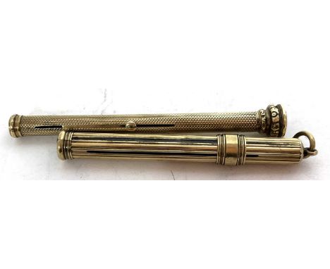 A 9ct gold pencil holder by Sampson Mordan &amp; Co with reeded decoration, top and top loop, 8cm long together with a yellow