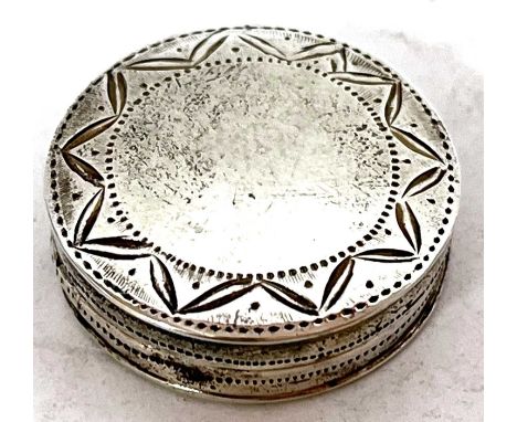 A George III silver patch box of circular form, the pull off covered lid with chased and engraved detailed border, makers mar