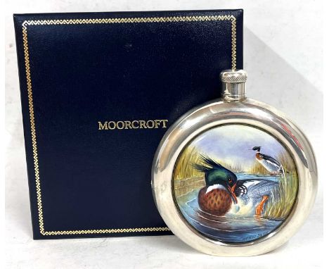 A Moorcroft silver and enamel Meganser hip flask 28/50, designed by W Creed, "boxed" with a small dent to the shoulder.