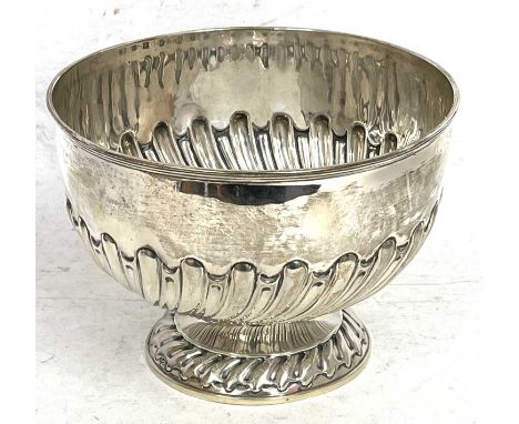 An Edwardian silver pedestal bowl, the body with partial half fluted wrythen design supported on a spreading circular foot, L