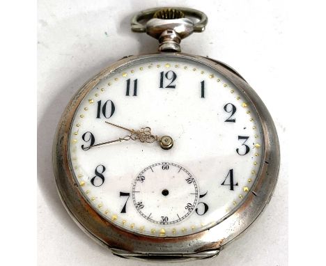 A white metal pocket watch, stamped in the case back 0.800 and features a crown wound movement, it also has a white enamel di