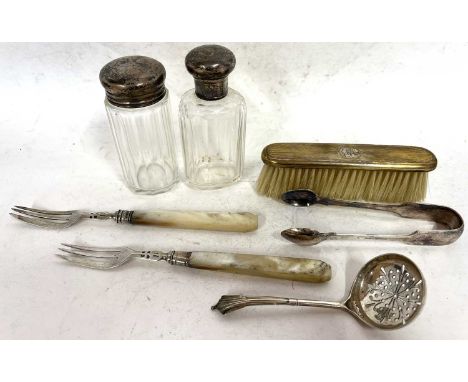 Mixed Lot: Hallmarked silver sifting spoon, two glass table jars with silver lids, a mother of pearl handled and silver prese