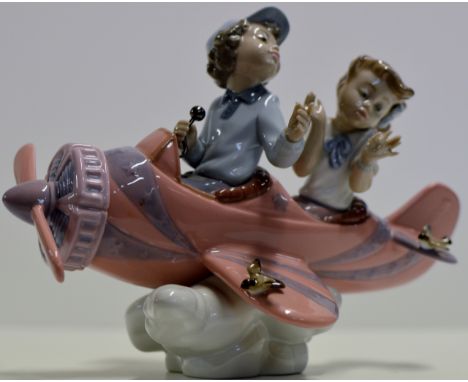 LLADRO DOUBLE FIGURINE ORNAMENT - BOY & GIRL ON A PLANE SURROUNDED BY BIRDS CONDITION - VERY GOOD, NO SIGNS OF ANY DAMAGE