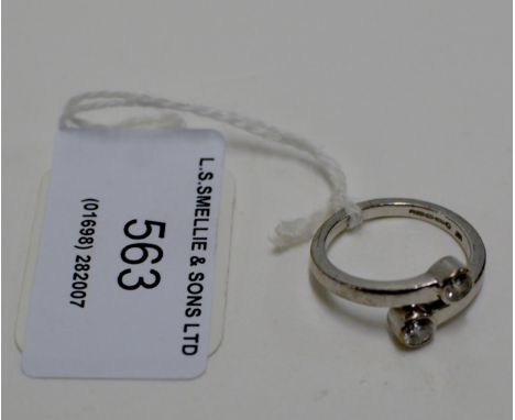 2 STONE DIAMOND RING SET ON 18 CARAT WHITE GOLD BAND - APPROXIMATE WEIGHT = 5 GRAMS     