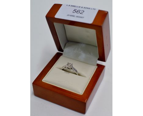 DIAMOND SOLITAIRE RING SET ON WHITE GOLD BAND - APPROXIMATE SIZE & WEIGHT = 0.33 CARATS / 2.3 GRAMS     