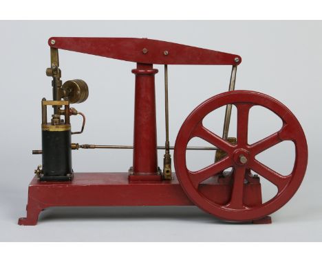 An engineers working model of a beam engine with pressure guage and 20cm diameter fly wheel, 39cm wide.    Condition Report. 