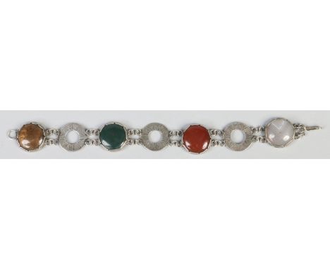 A Scottish white metal bracelet set with hardstone roundels, 17cm.   Condition Report. To be used as a guide only.  Good cond