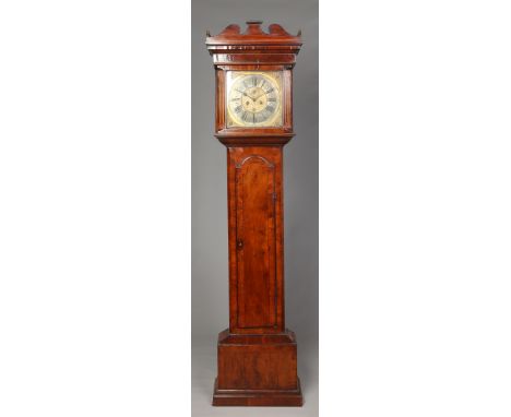 A George III yew wood longcase clock. With castellated swan neck pediment, marquetry inlaid fluted Corinthian column supports