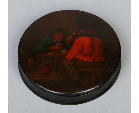 A 19th century Vernis Martin circular snuff box and cover decorated with a tavern interior scene, 10cm diameter.    Condition