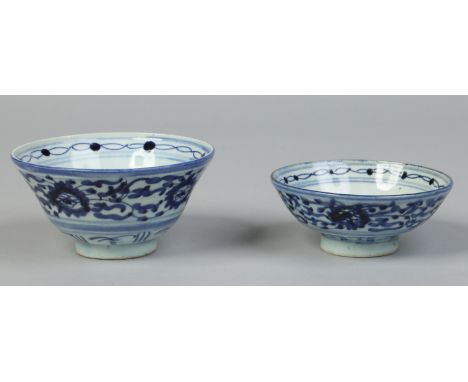 Two early Chinese provincial bowls. The larger of ogee form and both decorated in underglaze blue. Seal marks, ogee bowl diam