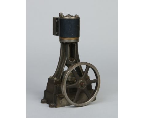 An engineers model of an overhead piston steam engine with flywheel, 23.5cm.   Condition Report. To be used as a guide only. 