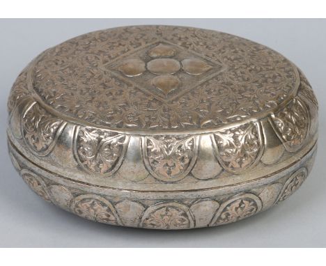 An Indian white metal repousse work ovoid box raised on four button feet, 19cm.    Condition Report. To be used as a guide on