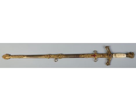 An American Masonic dress sword in gilt metal scabbard by M. C. Lilley & Co. Columbus, Ohio. With etched blade, enamelled mot