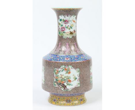 A late 20th century Chinese polychrome baluster vase. With celadon ground interior, painted with diaper grounds and having sh