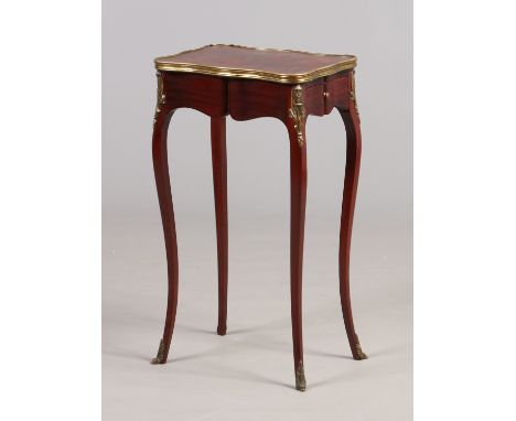 A 19th century kingwood single drawer occasional table with serpentine edges. Quarter veneered and cross banded, having gilt 