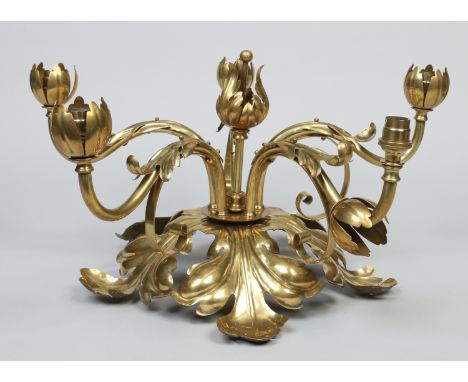 An Arts & Crafts brass five branch hanging lamp adorned with stylized foliage.    Condition Report. To be used as a guide onl