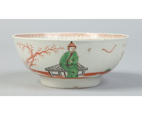 A small Liverpool bowl painted in coloured enamels with a chinoiserie scene with a figure smoking a pipe and another holding 