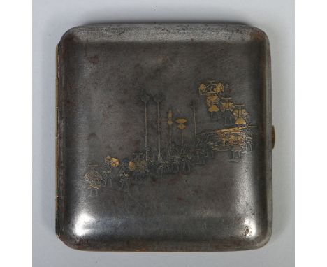 A Japanese gun metal Komai style cigarette case decorated in gold and silver with a procession of figures and mount Fuji to t