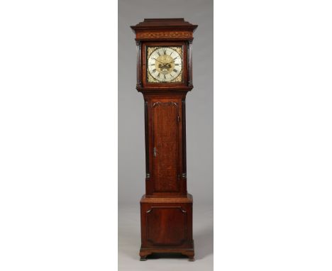 A George III oak eight day longcase clock quarter striking on three bells by Matthew Bushell. With stepped caddy top, fluted 
