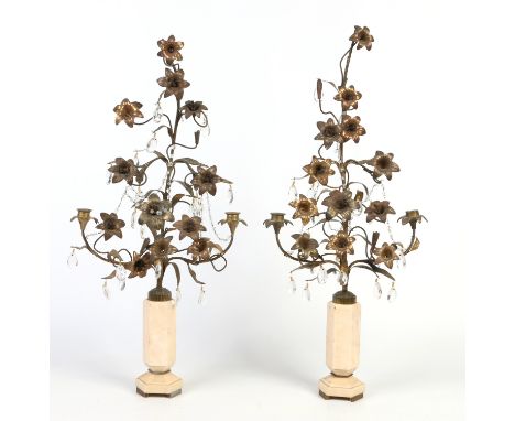 A pair of Art Deco naturalistic bronze and alabaster candelabras. Formed each as a towering spire of flowers and adorned with