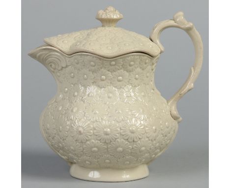 A Don pottery cream stoneware tisaniere and cover moulded with daisy heads. Applied mark, 17cm.    Condition Report. To be us