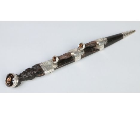 A Victorian Scottish pipers dirk with knife and fork en suite in silver mounted leather scabbard, each piece set with a cairn