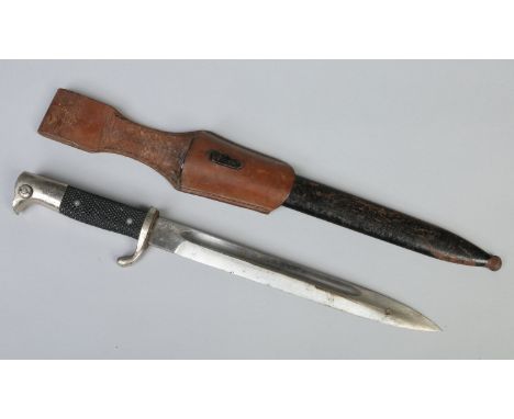 A German World War II bayonet in painted metal scabbard with leather frog. Fullered blade stamped Robert Klaas Solingen. Blad