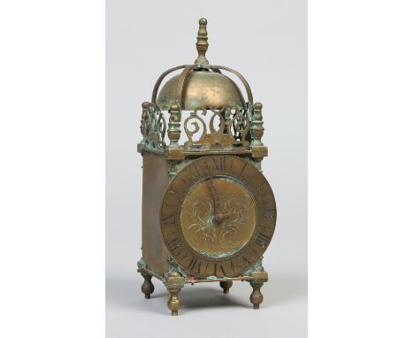 A Victorian brass lantern clock housing a French two train carriage clock movement, 25.5.