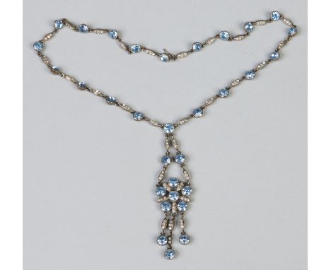 A white metal necklet with cornflower blue and white paste stones on solid back setting c1920. 