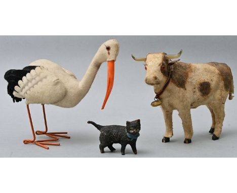 Drei Spielzeugtiere, teilweise Steiff, 2. H. 20. Jh.Pappmache, Stoff, Draht. Gebrauchsspuren. Storch der Firma Steiff (Marke 
