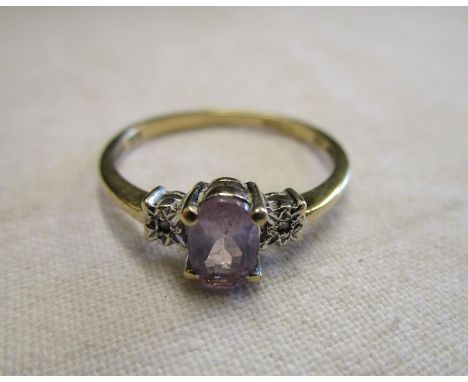 Gold amethyst and diamond set ring