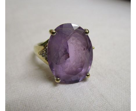 Gold diamond &amp; large amethyst set ring