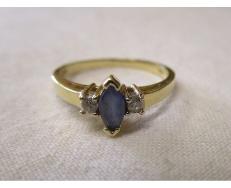 Gold tanzanite &amp; diamond set ring