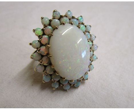 Large gold opal cluster ring