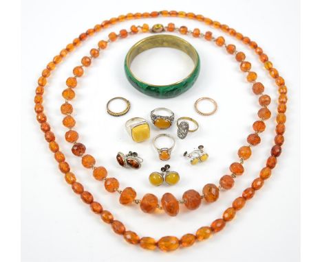 A group costume jewellery, including copal bead necklaces, a silver amber ring, size O 1/2, amber earrings, beaded necklaces,