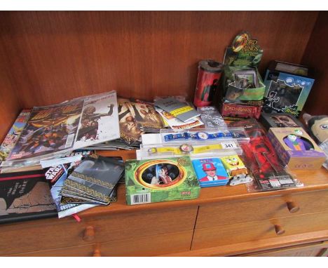 A collection of TV and movie related collectables including Walking Dead, Lord of the Rings, Super Heroes, Comics, DC, Game o