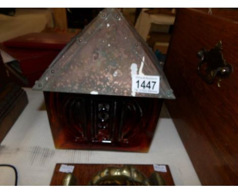 A Whitefriars style amber glass lamp shade with arts and crafts copper top (reputedly from Pheonix Manor in Bishops Norton).