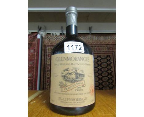 A full unopened 1 litre bottle of Vintage Glenmorangie Scotch whisky.